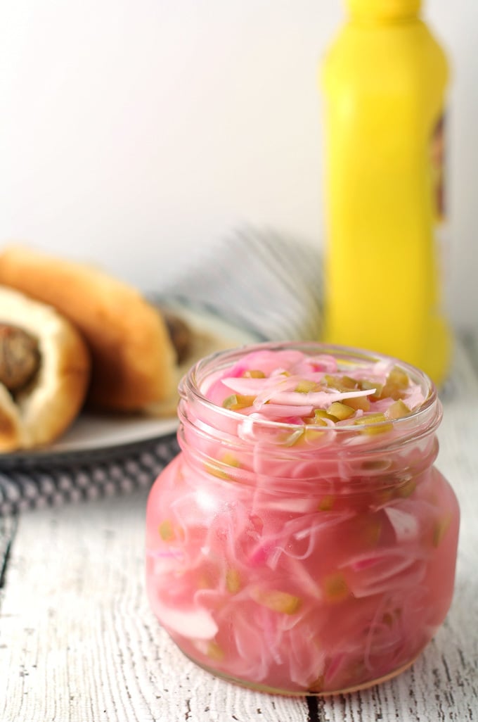 This onion relish recipe is perfect for summer barbecues! Put a jar of it next to the mustard and ketchup - your hot dogs and sausages will never be the same without it! | honeyandbirch.com