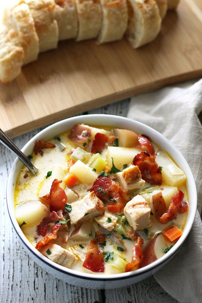 This chicken potato chowder is great for using up leftover grilled chicken breasts. It is easy to make and super tasty thanks to added bacon. | honeyandbirch.com