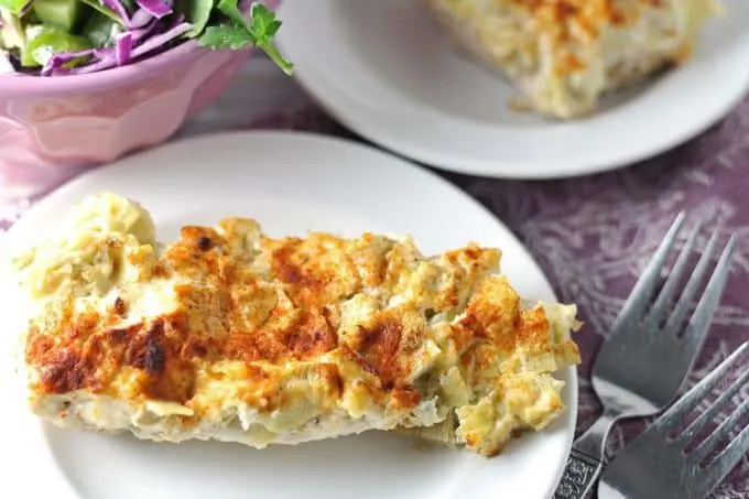 When chicken for dinner gets boring, make this Parmesan Artichoke Chicken dish! | honeyandbirch.com