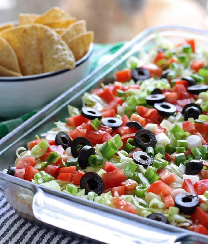 layered taco dip with chips