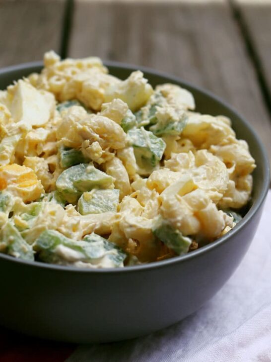 This boiled egg tuna macaroni salad recipe is an easy lunch recipe. It can be made quickly and has a nice crunch thanks to the diced green peppers. | honeyandbirch.com