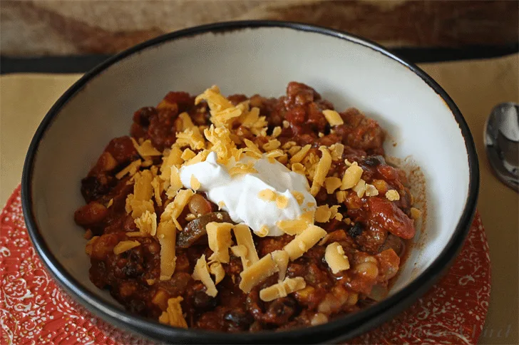 Everything but the kitchen sink chili is hearty! Full of meat and veggies, it's bound to become your favorite chili recipe.