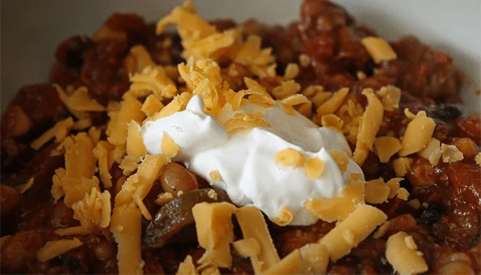 Everything but the kitchen sink chili is hearty! Full of meat and veggies, it's bound to become your favorite chili recipe.