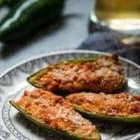 baked jalapeno poppers with a glass of beer