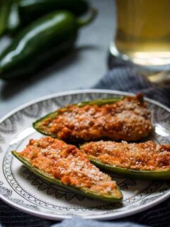 baked jalapeno poppers with a glass of beer