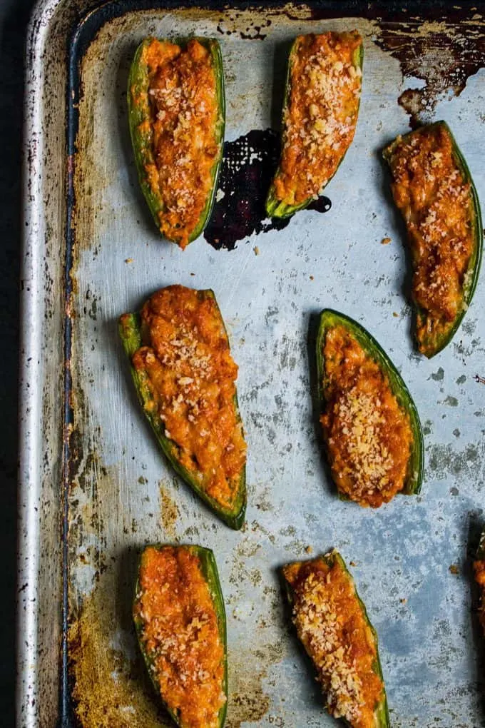 baked jalapeno poppers on a sheet pan