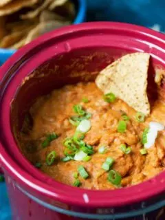 slow cooker bean dip with a chip