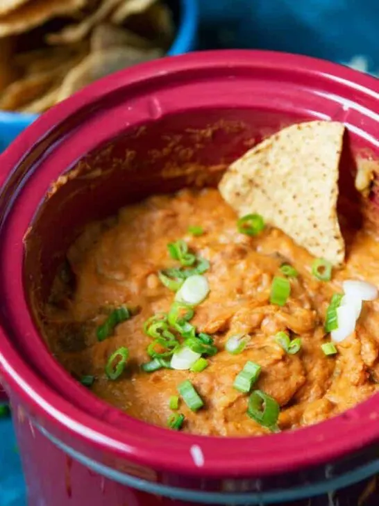 slow cooker bean dip with a chip