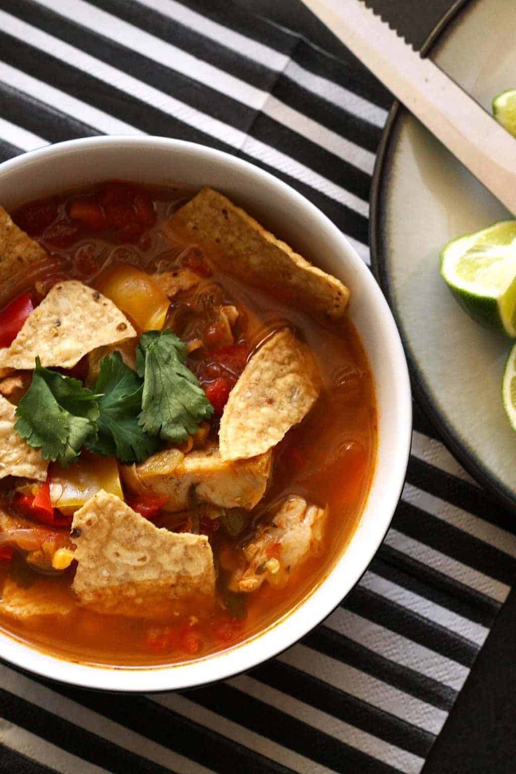 This chicken tortilla soup is easy to make thanks to pre-cooked chicken - you can even use a rotisserie chicken.  It is full of vegetables and spice!