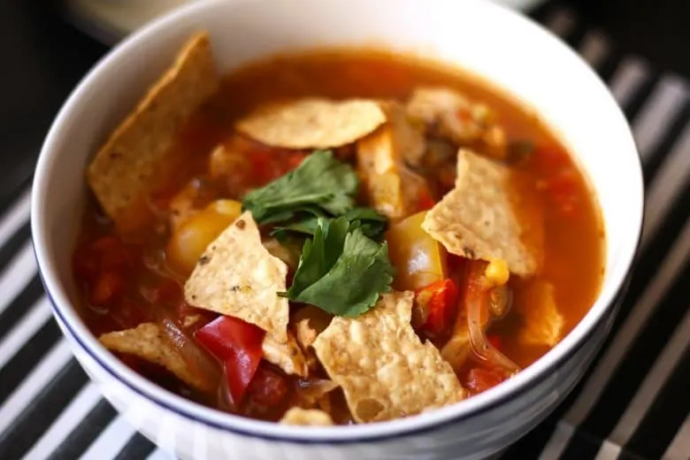 This chicken tortilla soup is easy to make thanks to pre-cooked chicken - you can even use a rotisserie chicken. It is full of vegetables and spice!