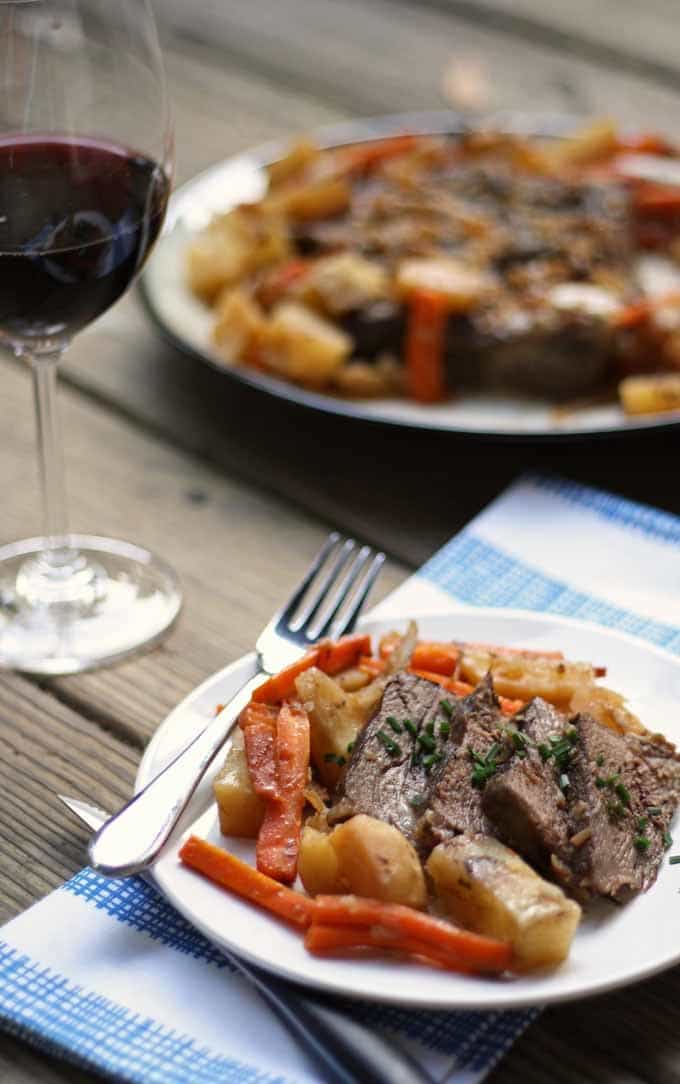 This slow cooker pot roast recipe is sure to make it on your Sunday supper rotation. Bust out that slow cooker and make this roast!