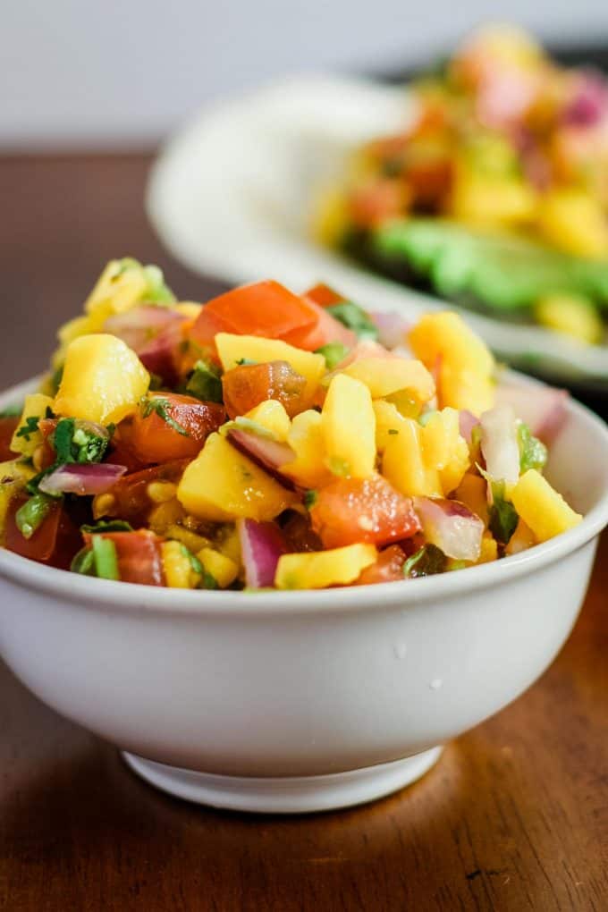 magno pico de gallo on fish tacos and in a bowl