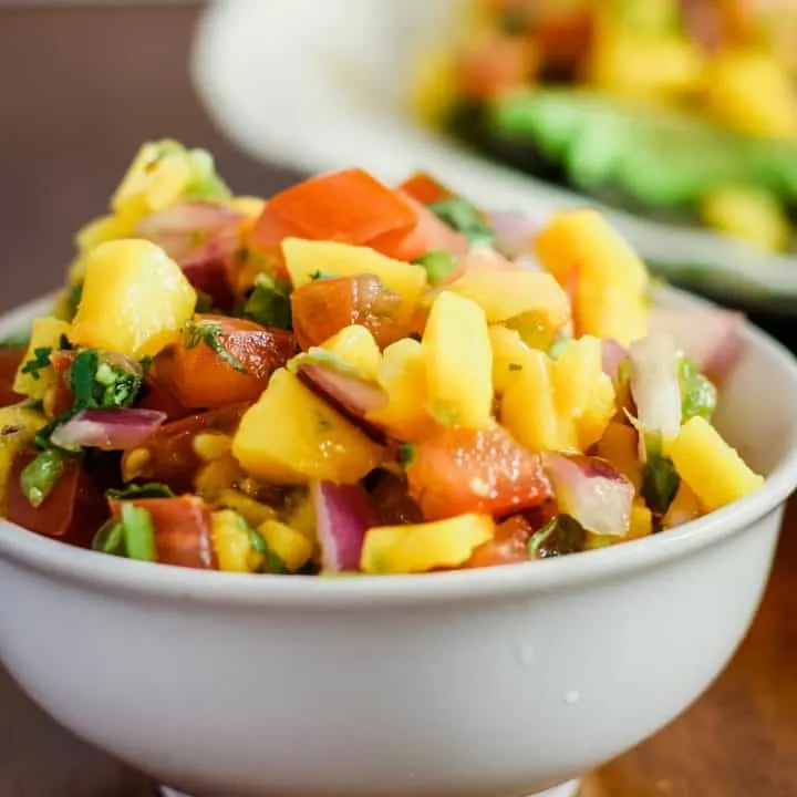 magno pico de gallo on fish tacos and in a bowl