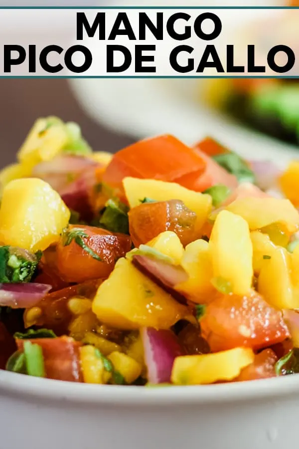 Mango pico de gallo - perfect on top of fish tacos! Also, great for dipping chips, inside a steak burrito or on top of a burger. | honeyandbirch.com