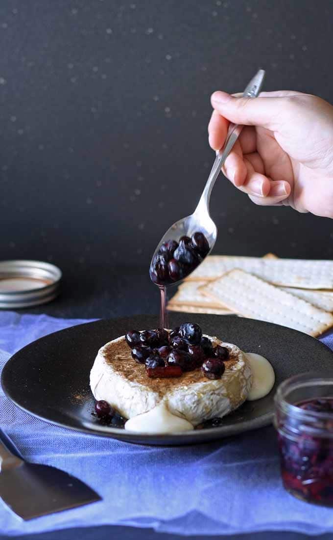 Brie and Pickled Blueberries - an easy appetizer perfect for dinner parties, book clubs and wine nights! #appetizer #bookclub #winenight #GNO