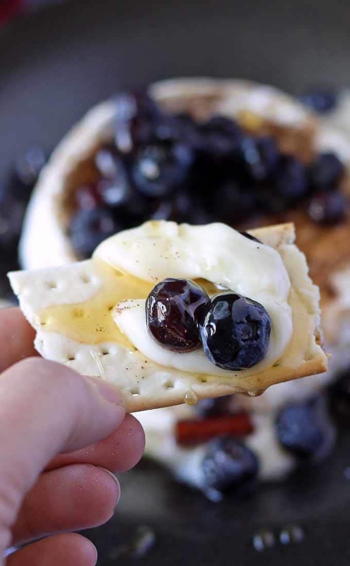 Brie and Pickled Blueberries - an easy appetizer perfect for dinner parties, book clubs and wine nights! #appetizer #bookclub #winenight #GNO