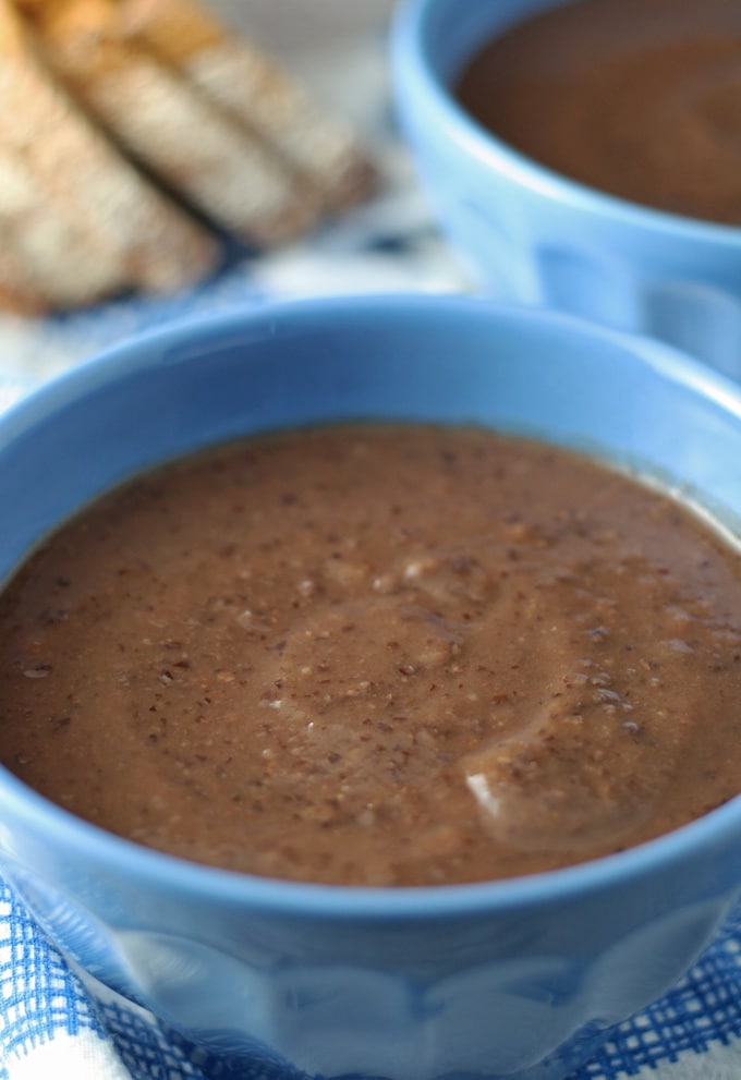 black bean soup in a blue bowl