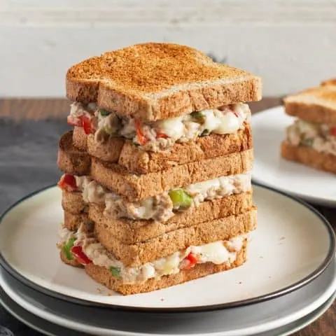 This blue cheese tuna melt is great for weekend lunches and brunch. Blue cheese is added to the tuna and American cheese is melted on top. This twist on an American classic can also be served open-face! | honeyandbirch.com