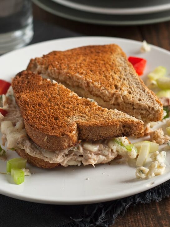 This blue cheese tuna melt is great for weekend lunches and brunch. Blue cheese is added to the tuna and American cheese is melted on top. This twist on an American classic can also be served open-face! | honeyandbirch.com