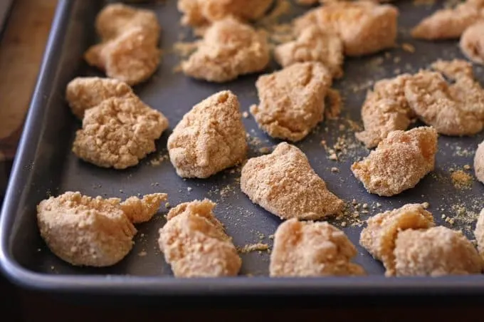 This recipe for baked graham cracker chicken tenders is perfect for a kids' dinner or an adult snack! 