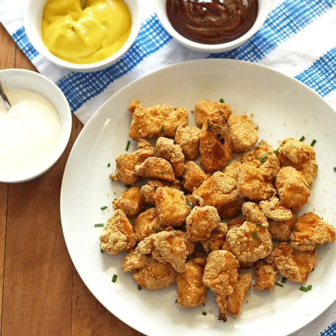 This recipe for baked graham cracker chicken tenders is perfect for a kids' dinner or an adult snack! 