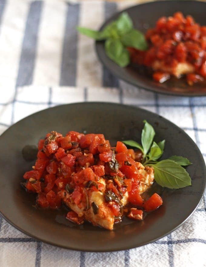 Get dinner on the table for your family with this an easy recipe for slow cooker bruschetta chicken!