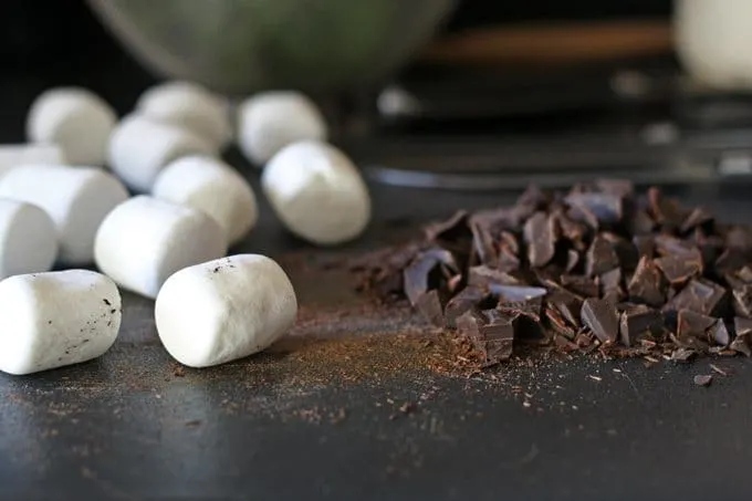 Fudgy s'mores brownies will help you keep the bonfire burning all winter long! #brownie #smores #baking #dessert