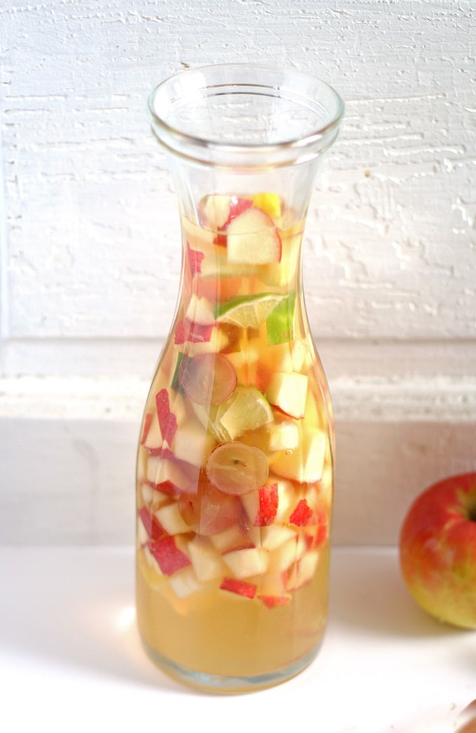 White wine apple cider sangria is the perfect addition to fall brunches. Grab your ingredients and try this recipe today! | honeyandbirch.com