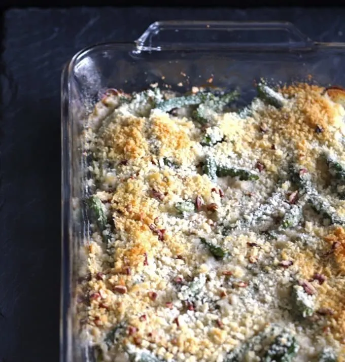 Gorgonzola green bean casserole is a perfect Thanksgiving side dish - add pecans and panko bread crumbs for extra crunch! | www.honeyandbirch.com