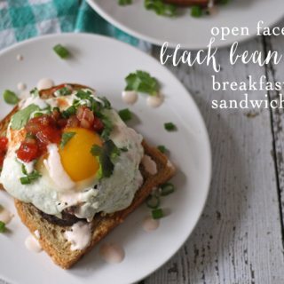 Looking for a delicious recipe for an at-home brunch? Try this recipe for open face black bean cake breakfast sandwiches! | www.honeyandbirch.com | #brunch #breakfast #vegetarian