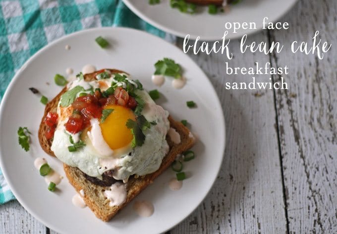 Looking for a delicious recipe for an at-home brunch? Try this recipe for open face black bean cake breakfast sandwiches! | www.honeyandbirch.com | #brunch #breakfast #vegetarian