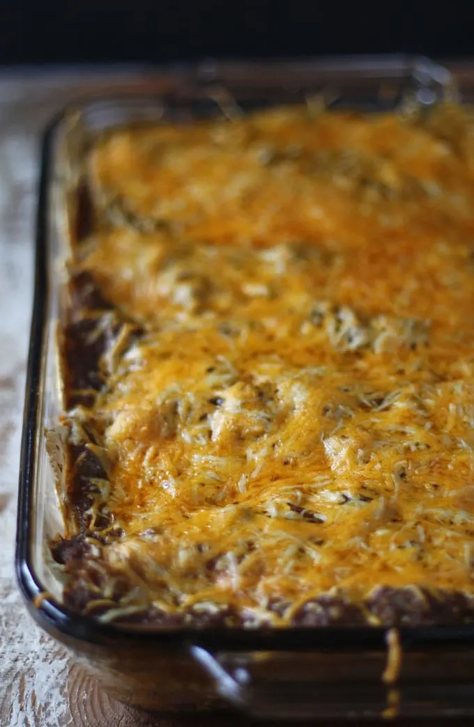 Black Bean Enchiladas with Jalapeno Crema | www.honeyandbirch.com #mexican