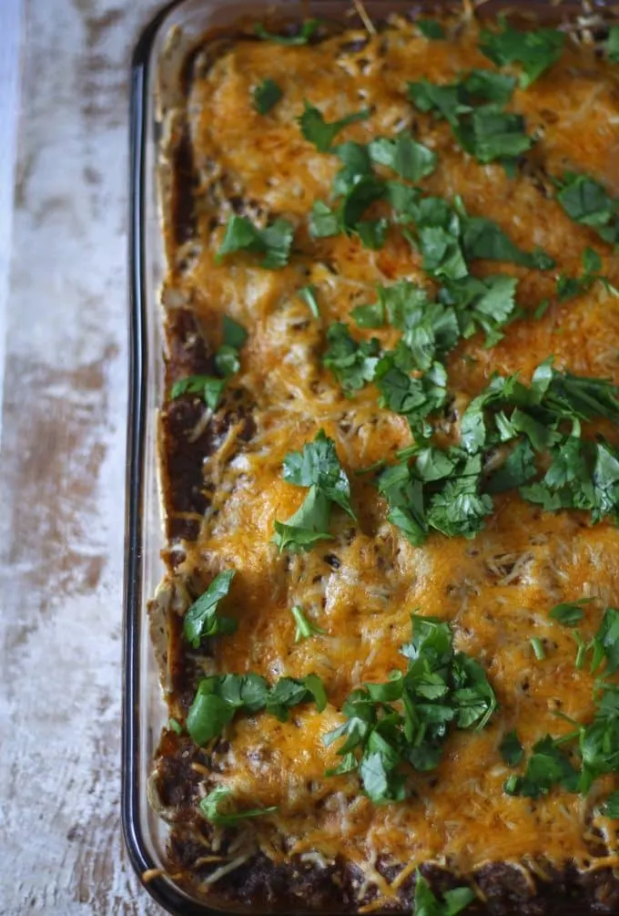 Black Bean Enchiladas with Jalapeno Crema | www.honeyandbirch.com #mexican