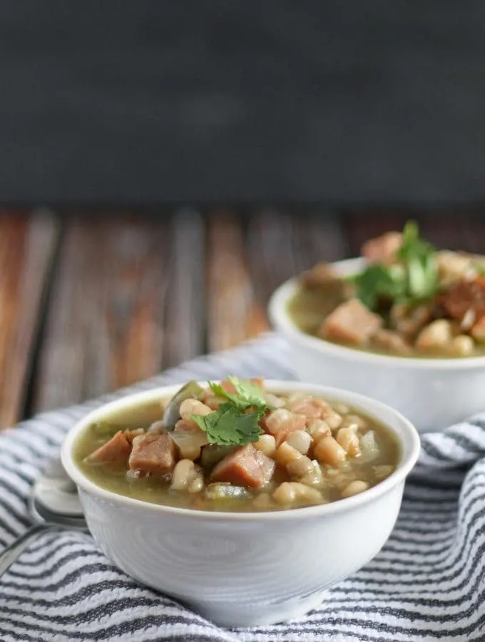 Great way to use up leftover Christmas ham! Ham and White Bean Soup | www.honeyandbirch.com #leftovers