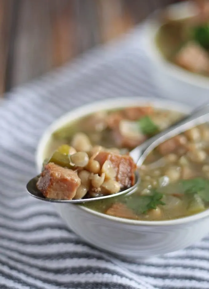 Great way to use up leftover Christmas ham! Ham and White Bean Soup | www.honeyandbirch.com #leftovers