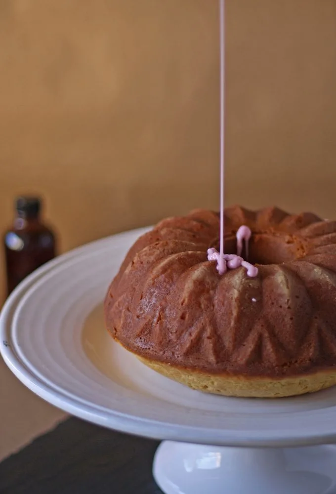 Vanilla Bean Bundt Cake with Pomegranate Glaze | www.honeyandbirch.com