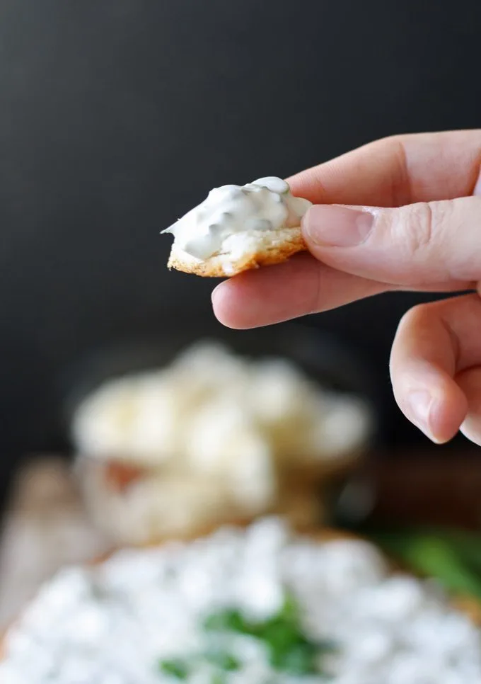 green onion dip recipe on a chunk of bread