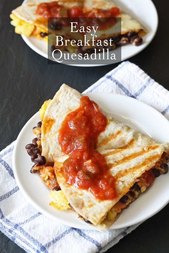 This easy breakfast quesadilla is a great way to start your day - full of eggs, black beans and cheese! Only 10 minutes to cook. | www.honeyandbirch.com