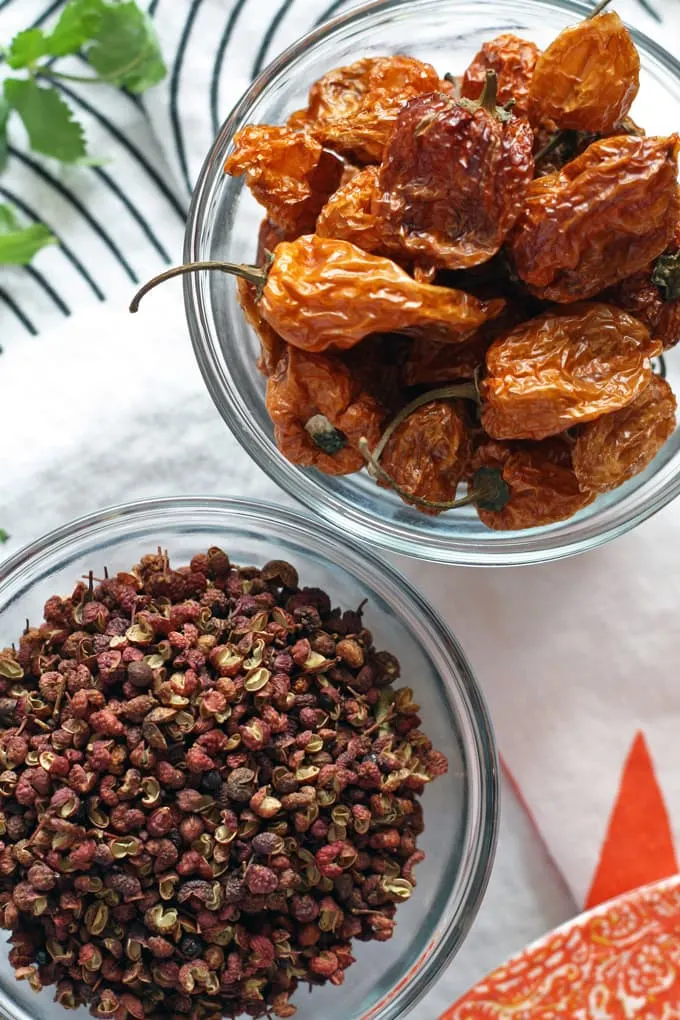 Fire Chicken Recipe - the perfect blend of Szechuan peppercorns and dried habanero peppers! | www.honeyandbirch.com #spicy #dinner