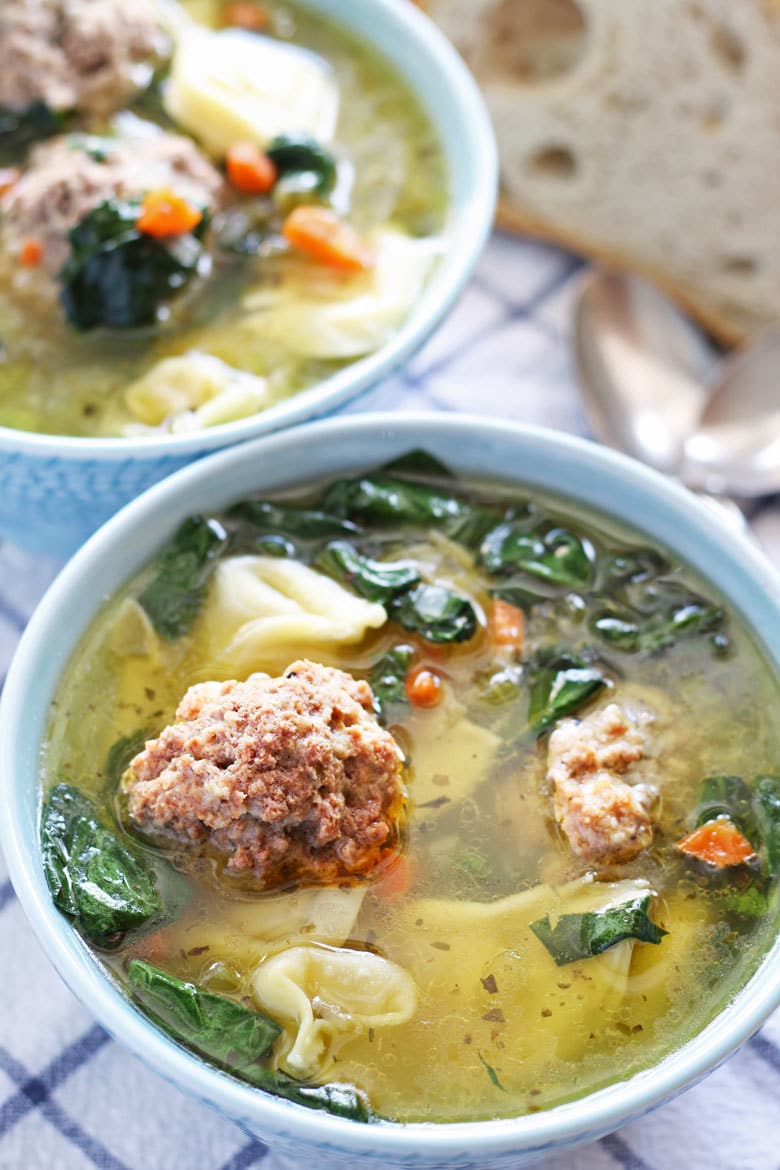 This easy meatball tortellini soup is hearty and perfect for lunch or dinner! Made with store-bought tortellini and giant meatballs! | honeyandbirch.com