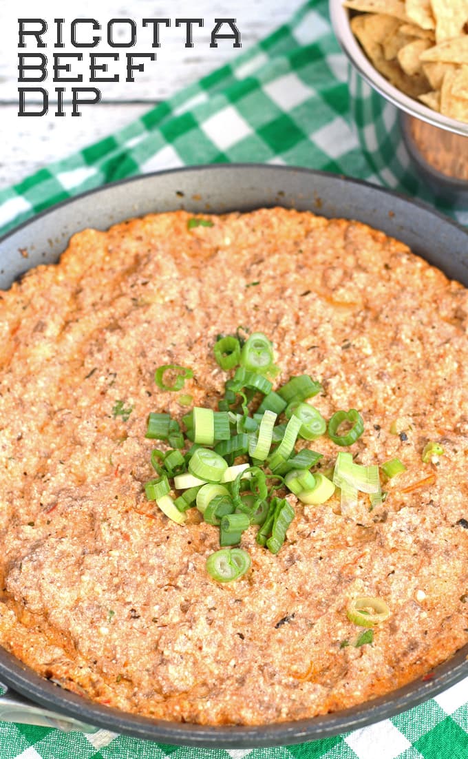 Ricotta beef dip - a cross between pizza and lasagna without the carbs! Ricotta and pizza sauce are combined with ground beef for this easy appetizer. | honeyandbirch.com