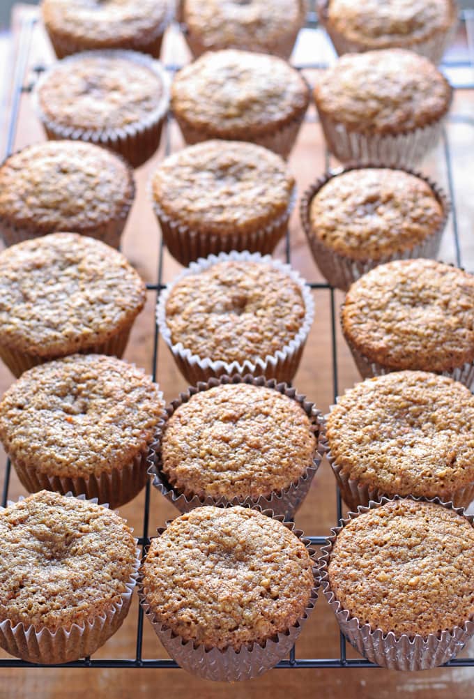 Delicious carrot cake cupcakes, filled and topped with sweet cream cheese frosting! | honeyandbirch.com