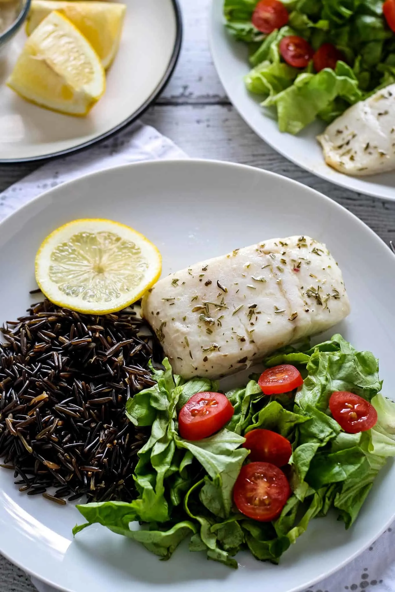 easy baked alaskan halibut with wild rice and a small salad