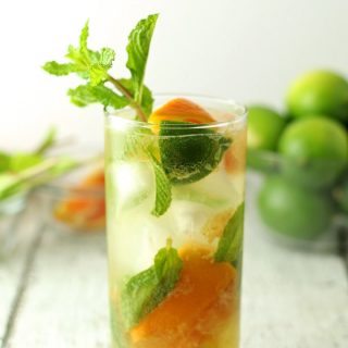 Orange mojitos are the perfect refreshing summer drink! Keep all the ingredients on hand so you can make them all summer long! #cocktail | honeyandbirch.com