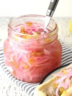 This onion relish recipe is perfect for summer barbecues! Put a jar of it next to the mustard and ketchup - your hot dogs and sausages will never be the same without it! | honeyandbirch.com