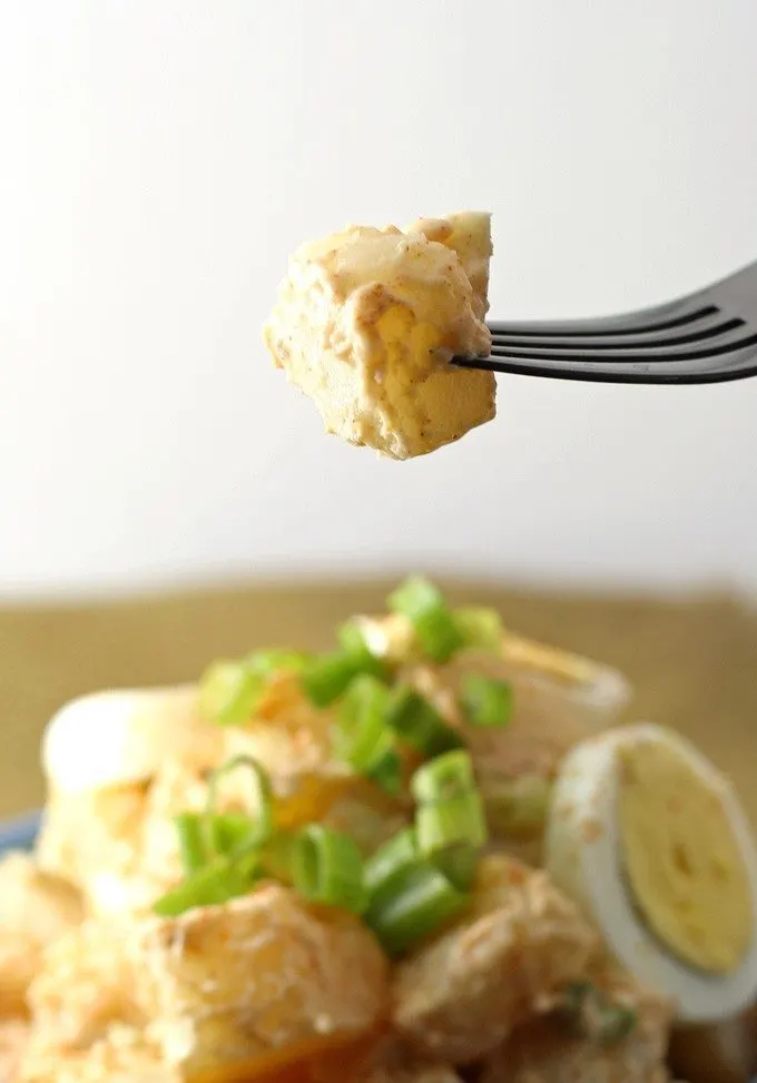 potato egg salad on a fork