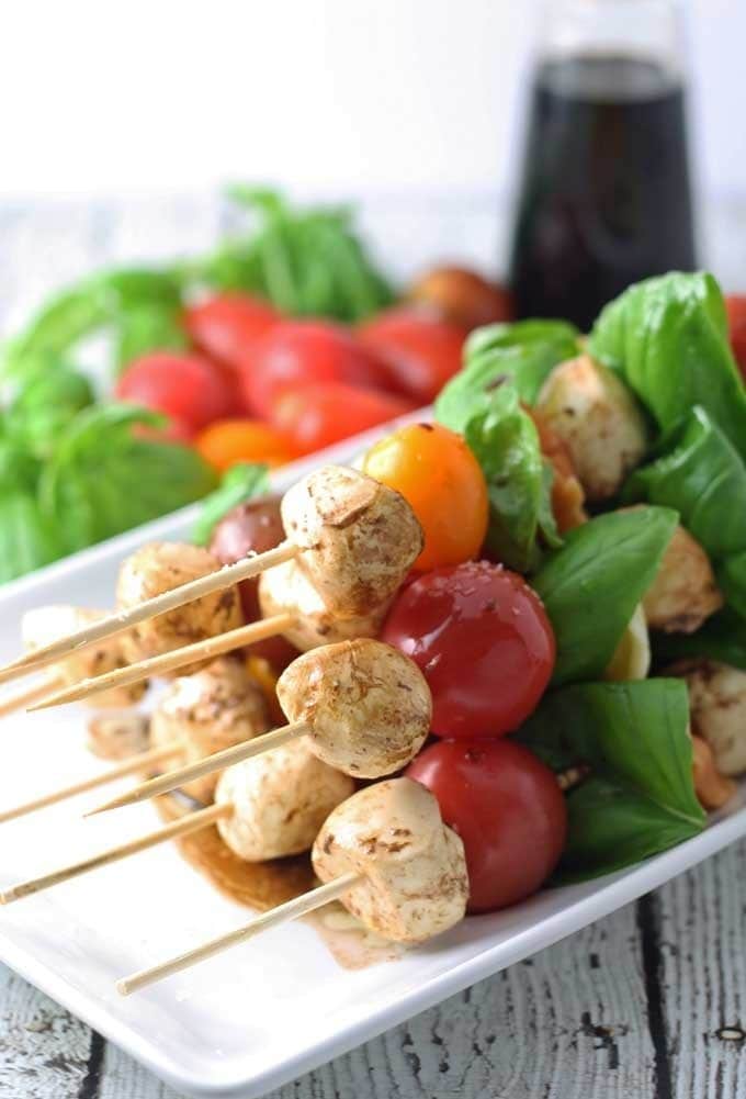 Caprese Tortellini Skewers are a fun appetizer on a stick! Perfect for parties and barbecues. | honeyandbirch.com