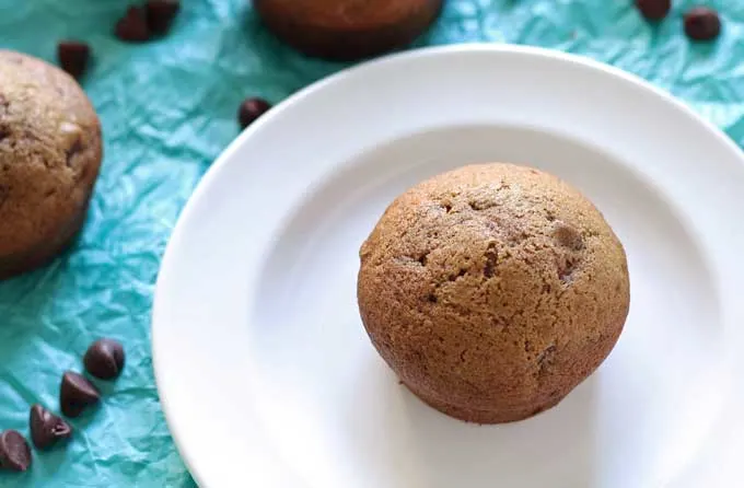 This chocolate orange muffin recipe is great for breakfast, or dessert. Grab a muffin and a glass of milk. | honeyandbirch.com