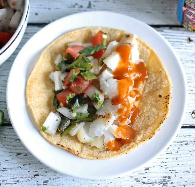 Fish Tacos with Poblano Pepper Pico de Gallo #KingOfFlavor #ad | honeyandbirch.com