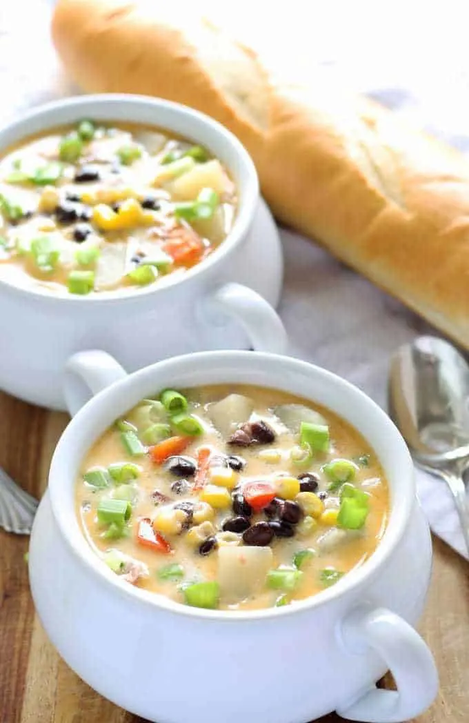 This black bean corn chowder is hearty and perfect for cool nights and corn season! | honeyandbirch.com